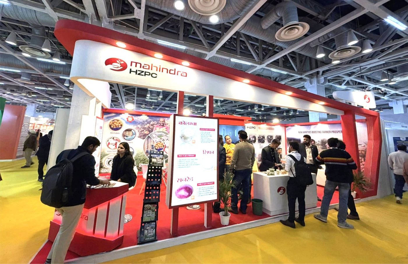 A large seed potato stand with variety boards in Hindi at the first Global Potato Summit