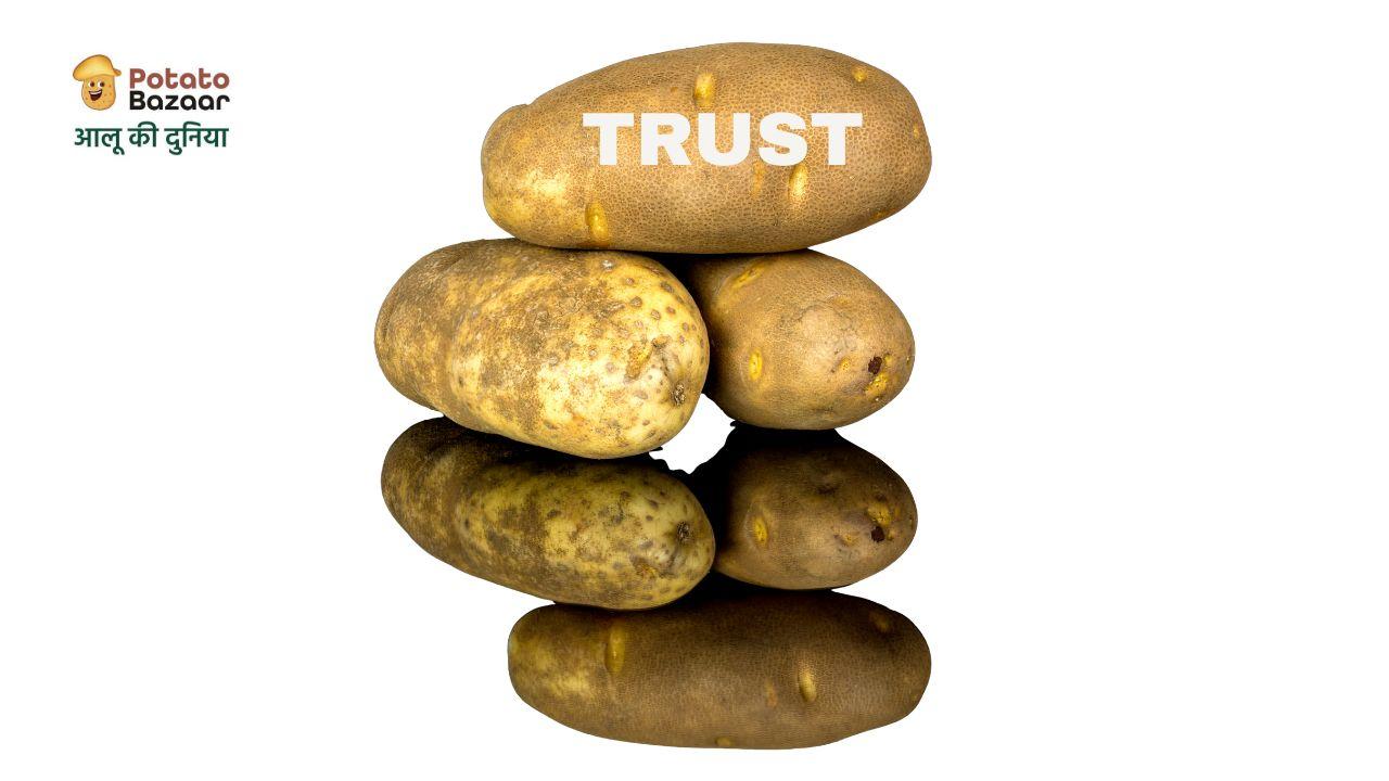 Stacked potatoes with the word TRUST overlaid — Potato Bazaar's theme of verification and trust in potato trading partnerships